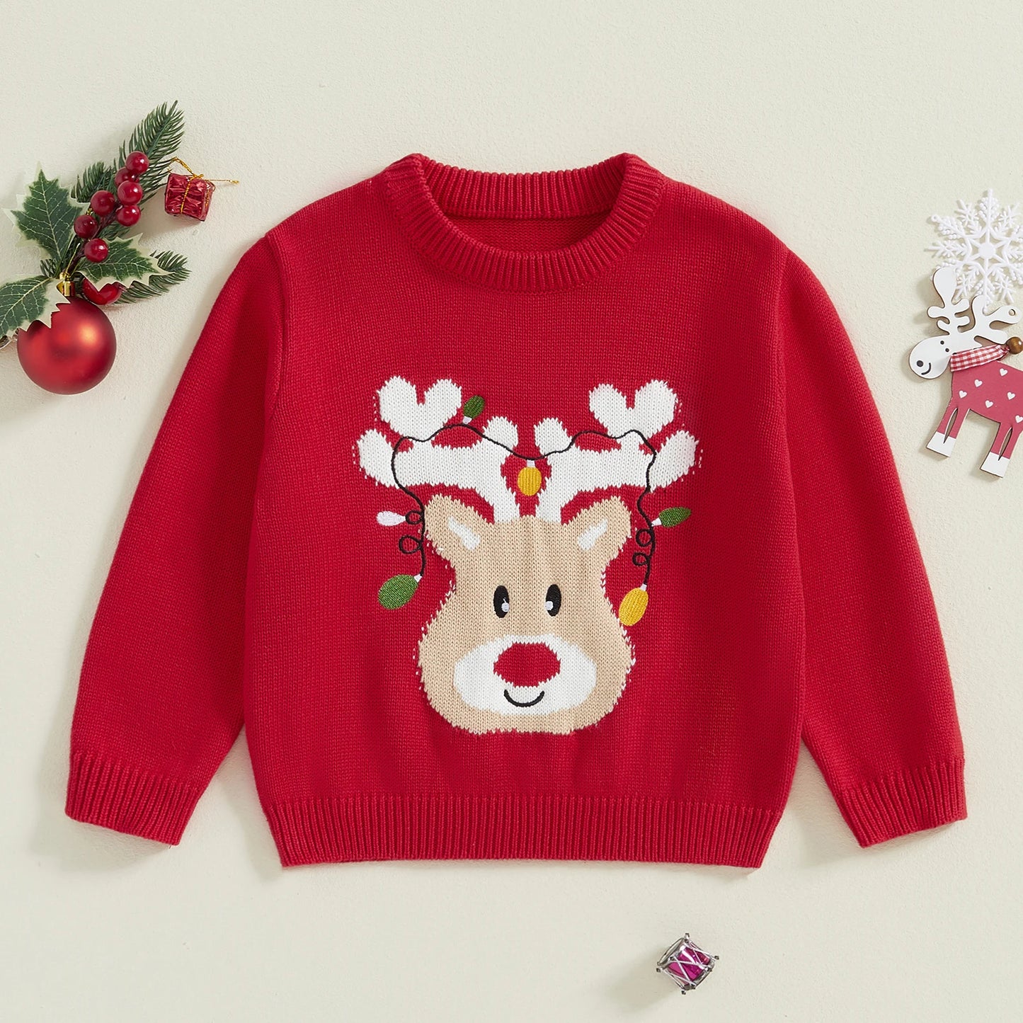 Weihnachtsgestrickte Baby-Mädchenpullover